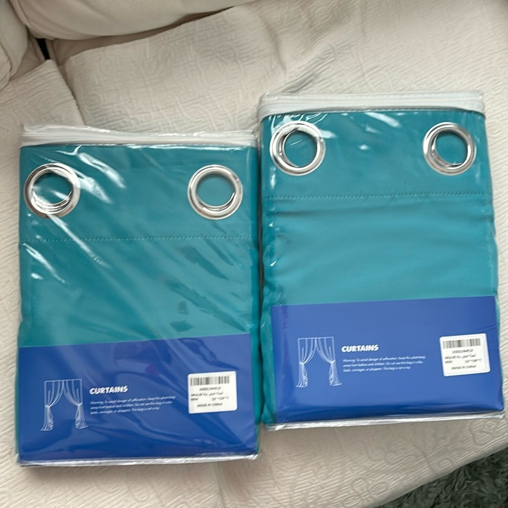 2 teal outdoor grommeted curtain panels 52 x 108”